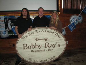 Pennsauken native Bobby Ray Harris (center) and long-time residents Steve Memmo and Jennifer Rodgers help provide a true “home town” feel to Bobby Ray’s Pennsauken Tavern.