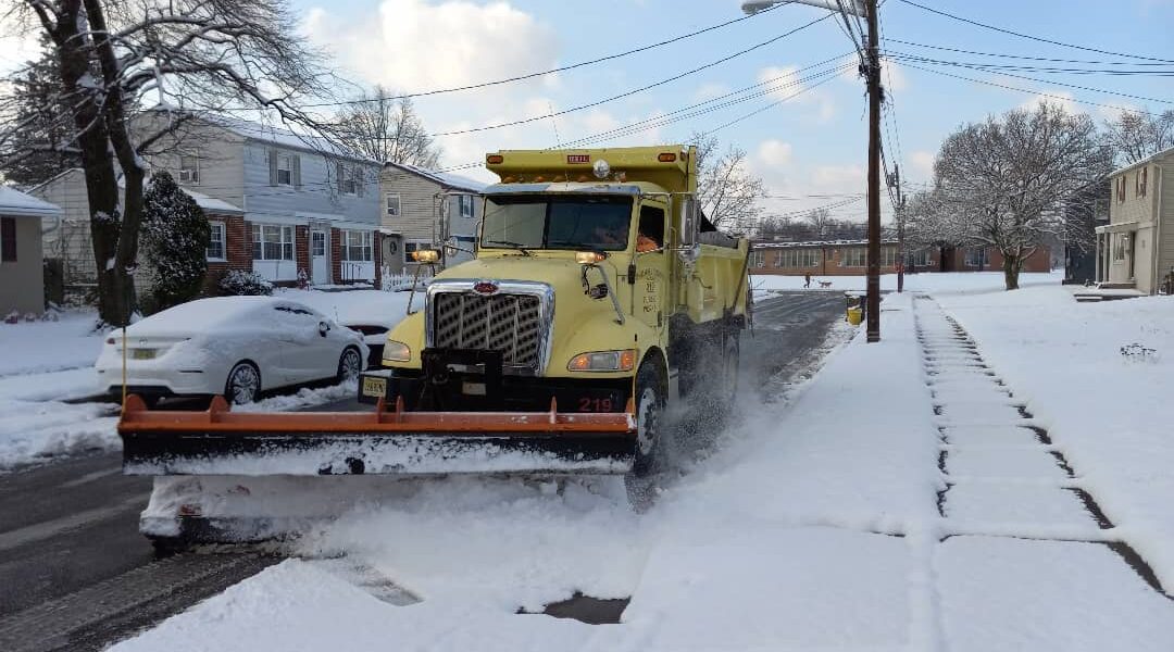 Public Works truck plowing snow in Pennsauken.