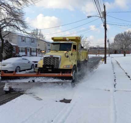 Public Works truck plowing snow in Pennsauken.
