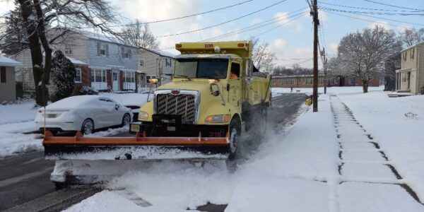 Public Works truck plowing snow in Pennsauken.